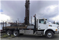 2005 Sterling LT9500 Flat Bed Pipe Truck Sterling LT9500 Flat Bed Pipe Truck Image